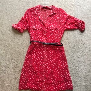 Button up shirt dress with pockets and belt.